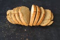 Isolate of white loaf of bread with sliced Ã¢â¬â¹Ã¢â¬â¹pieces on a black background Royalty Free Stock Photo